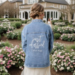 Modern Just Married White Script Typography  Denim Jacket<br><div class="desc">Celebrate your newlywed status with our Modern Just Married White Script Typography Denim Jacket! This stylish jacket features elegant white script typography that beautifully contrasts with the classic denim. Perfect for post-ceremony celebrations, receptions, or honeymoon adventures, it adds a chic and contemporary touch to your bridal ensemble. Made from high-quality...</div>