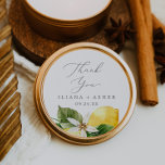 Modern Lemon Garden Thank You Favor Sticker<br><div class="desc">These modern lemon garden thank you favor stickers are perfect for a spring or summer wedding reception. The rustic mediterranean design features bright and beautiful watercolor lemons with bohemian white flowers and elegant green leaves. Personalize the sticker labels with your names, the event (if applicable), and the date. These stickers...</div>