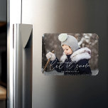 Modern Let it Snow Script Photo Magnet<br><div class="desc">Wish friends and family happy holidays with a cute holiday photo magnet! The magnet features your horizontal photo with subtle snow flurries bordering the design. "Let it Snow" is displayed in a white,  trendy calligraphy script with your family's name below.</div>