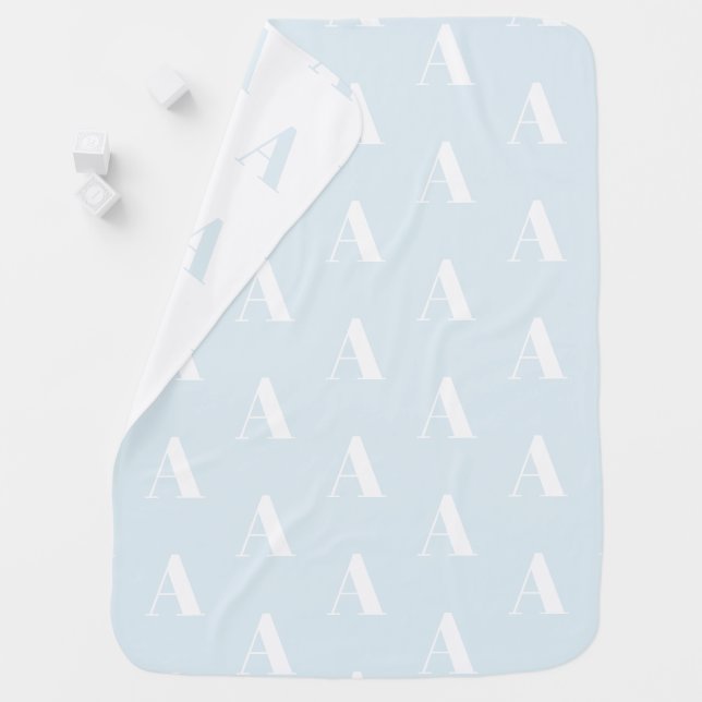 Modern light blue and white custom initial pattern baby blanket (In Situ)