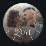 Modern Love Custom Wedding Photo Couples Monogram Large Clock<br><div class="desc">Celebrate your love story in a timeless way with the Modern Love Custom Wedding Photo Couples Monogram Watch — a beautifully personalized timepiece designed to honor your most meaningful moments. This elegant watch showcases your favorite couple photo paired with a clean, modern monogram, creating a one-of-a-kind accessory that’s both sentimental...</div>