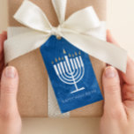 Modern Menorah Blue Hanukkah Gift Tag<br><div class="desc">This Happy Hanukkah gift tag features modern and fun menorah illustration that stands out against a textured background on blue (or ANY COLOR of your choice using the "customize it" button!). The backer is white with personalizable text in the "from" area for handy, pre-printed tags or you can clear the...</div>