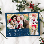 Modern Merry Christmas 4 Photo Collage Holiday Card<br><div class="desc">Simple and elegant holiday card featuring a 3 photo collage on the front with "Merry Christmas" displayed in white modern lettering on a navy blue background. Personalize the front of the card by adding your photos and name. The card reverses to display the fourth photo with a white snowflake pattern....</div>