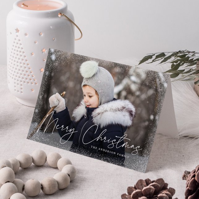Modern Merry Christmas Script Snow Flurries Photo Holiday Card (Creator Uploaded)