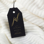 Modern Minimal Elegant Script Monogram Wedding Gift Tags<br><div class="desc">Modern Minimal Elegant Calligraphy Script Monogram Wedding Gift Tags Add a touch of elegance to your wedding favors with these stunning, modern, minimalist, and elegant calligraphy script monogram gift tags. Crafted in classic black and gold, these tags are the perfect way to personalize your gifts and thank your guests. The...</div>
