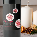 Modern Minimal Nordic Black Red White Christmas Wine Label<br><div class="desc">Enhance the sophistication of your festive gatherings by incorporating this personalized Christmas wine label. The label is adorned with three charming red and white snowflakes, suspended like delicate ornaments against a sophisticated black backdrop. The festive greeting "Merry Christmas" is beautifully scripted in a modern font, inviting warmth and cheer. Below...</div>