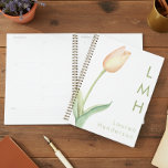Modern Minimal Peach Watercolor Tulip Monogram Planner<br><div class="desc">Introducing our modern and elegant planner,  where simplicity and the beauty of a single stem pale peach watercolor tulip take center stage. Against a pristine background,  this design captures the essence of pure and understated elegance. Add a name and initials for a personal touch. Created by Simply Farmhouse Press.</div>
