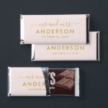 Modern Minimal Pink Gold Personalized Mr and Mrs Hershey Bar Favors<br><div class="desc">Custom wedding Hershey's Miniatures candy favors displays a a modern and minimal "Mr and Mrs" script monogram design that can be personalized with your married last name in all caps sans serif text. Chic design features simple wedding date text and a thank you message appears on the back. The classic...</div>