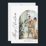 Modern Minimalist Arch Photo Merry Christmas Holiday Card<br><div class="desc">This elegant holiday card features a sleek, minimalist design with a modern arched frame to highlight your family photo beautifully. The clean lines and simple typography create a timeless and sophisticated look, perfect for spreading holiday cheer. "Merry Christmas" is displayed in a contemporary font, with space to include your personalized...</div>