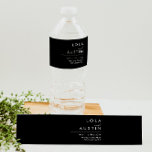 Modern Minimalist | Black Water Bottle Label<br><div class="desc">This modern minimalist | black water bottle label is perfect for your classy boho wedding. Its simple, unique abstract design accompanied by a contemporary minimal script and a black and white color palette gives this product a feel of elegant formal luxury while staying simplistic, chic bohemian. Keep it as is,...</div>