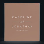 Modern Minimalist Script Custom Wedding Warm Mocha 3 Ring Binder<br><div class="desc">Organize your wedding plans in style with this modern minimalist 3-ring binder featuring elegant script typography on a warm mocha background. Perfect for keeping track of your guest lists, vendor contracts, and timelines, this customizable binder combines functionality with sleek design. Ideal for couples who appreciate simplicity and sophistication, it’s a...</div>