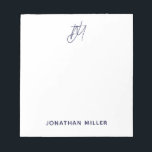 Modern Minimalist Script Monogram White Notepad<br><div class="desc">Keep all of your notes organized with this modern minimalist script monogram notepad. Featuring a sleek and simple design,  this notepad is perfect for use at home,  in the office,  or on-the-go. The white background and customizable navy blue script monogram make this notepad a stylish addition to any workspace.</div>