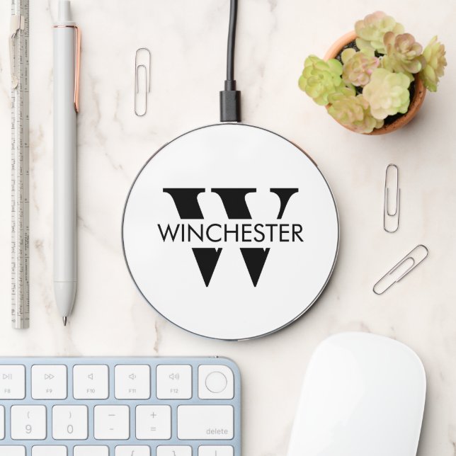 Modern monogram black white name letter typography wireless charger  (Desk)