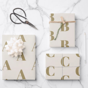Modern monogram gold cream monochromatic pattern wrapping paper sheets