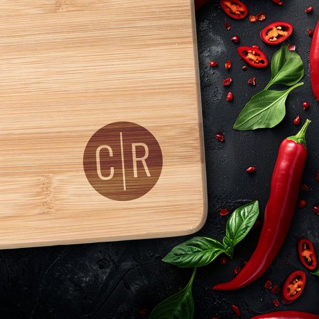 Modern monogram initials on dark circle engraved cutting board (Modern monogram initials on dark circle cutting board)