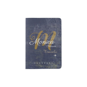 modern monogram on aged blue passport holder