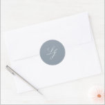 Modern Monogram Simple Script Dusty Blue Wedding Classic Round Sticker<br><div class="desc">Add a touch of sophistication to your wedding stationery with our Modern Monogram Simple Script Dusty Blue Wedding Classic Round Sticker. This beautifully designed sticker features a luxurious dusty blue and white palette, perfect for enhancing the elegance of any formal affair. The refined calligraphy script and classic monogram design create...</div>