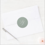 Modern Monogram Simple Script Sage Green Wedding Classic Round Sticker<br><div class="desc">Add a touch of sophistication to your wedding stationery with our Modern Monogram Simple Script Sage Green Wedding Classic Round Sticker. This beautifully designed sticker features a luxurious sage green and white palette, perfect for enhancing the elegance of any formal affair. The refined calligraphy script and classic monogram design create...</div>