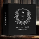 Modern Monogram Wedding Black Floral Crest<br><div class="desc">Organize your wedding plans in style with the Modern Monogram Wedding Floral Crest 3-Ring Binder. Featuring a chic floral crest design, this binder is perfect for storing wedding documents, notes, and inspirations. Customize with your initials for a personalized touch. With its sturdy construction and elegant design, it serves as a...</div>