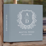 Modern Monogram Wedding Dusty Blue Crest<br><div class="desc">Organize your wedding plans in style with the Modern Monogram Wedding Floral Crest 3-Ring Binder. Featuring a chic floral crest design, this binder is perfect for storing wedding documents, notes, and inspirations. Customize with your initials for a personalized touch. With its sturdy construction and elegant design, it serves as a...</div>