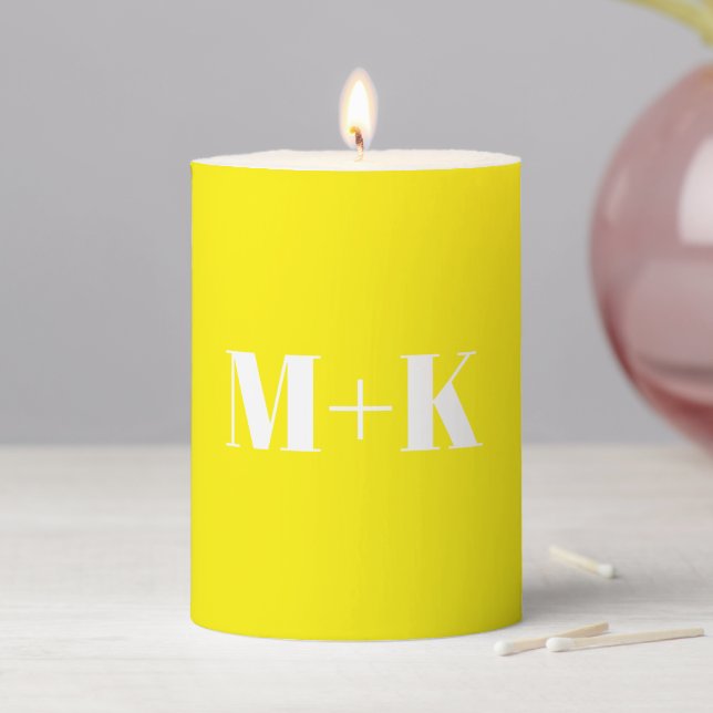 Modern monogram yellow custom couple's initials pillar candle (In Situ)