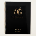Modern Monogrammed Black and Gold Script Planner<br><div class="desc">Minimalist gold monogrammed script against a black background. Easily customize name and monogram of choice on front and back.</div>