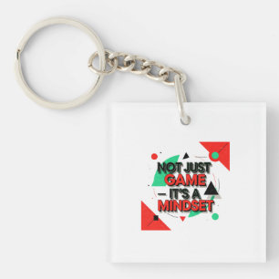 Modern Motivational Graphic with "Not Just Game It Keychain