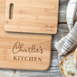 Modern name kitchen cutting board<br><div class="desc">Cutting board featuring your name in a modern script font with customizable text "kitchen" below.</div>