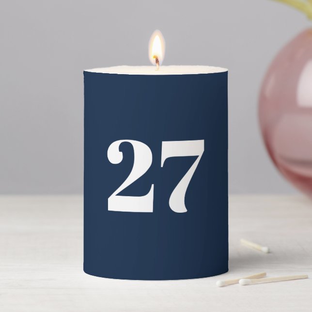 Modern navy blue custom number birthday party pillar candle (In Situ)