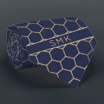 Modern Navy Blue Gold Foil Geometric Monogram Neck Tie<br><div class="desc">Modern Navy Blue Gold Foil Geometric Monogram Necktie in a stylish pattern of stylish gold hexagons on an elegant navy blue background. Easy to customize with text, fonts, and colors. Created by Zazzle pro designer BK Thompson © exclusively for Cedar and String; please contact us at cedarandstring@gmail.com if you need...</div>