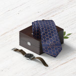 Modern Navy Blue Rose Gold Foil Geometric Monogram Neck Tie<br><div class="desc">Modern Navy Blue Rose Gold Foil Geometric Monogram Necktie in a stylish pattern of copper rose gold hexagons on an elegant navy blue background. Easy to customize with text, fonts, and colors. Created by Zazzle pro designer BK Thompson © exclusively for Cedar and String; please contact us if you need...</div>