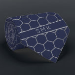 Modern Navy Blue Silver Foil Geometric Monogram Neck Tie<br><div class="desc">Modern Navy Silver Foil Geometric Monogram Necktie in a stylish pattern of silvery grey hexagons on an elegant navy blue background. Easy to customize with text, fonts, and colors. Created by Zazzle pro designer BK Thompson © exclusively for Cedar and String; please contact us at cedarandstring@gmail.com if you need assistance,...</div>