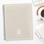 Modern Neutral Cream Beige Family Name Planner<br><div class="desc">Custom-designed planner notebook featuring classic modern family name monogram design on neutral earthy color background.</div>