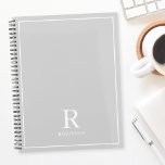 Modern Neutral Gray Family Name Planner<br><div class="desc">Custom-designed planner notebook featuring classic modern family name monogram design on neutral earthy color background.</div>