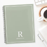 Modern Neutral Sage Family Name Planner<br><div class="desc">Custom-designed planner notebook featuring classic modern family name monogram design on neutral earthy color background.</div>