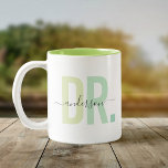 Modern New Doctor PhD Custom Name Appreciation Two-Tone Coffee Mug<br><div class="desc">Cute,  modern coffee mug saying DR. in modern typography in dusty green tones with your family name in trendy script calligraphy on a two-toned coffee mug. Perfect appreciation gift for a special doctor in your life,  a heartfelt thank you,  or PhD graduation gift!</div>