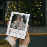 Modern Nutcracker Merry Christmas Photo Typography Holiday Card<br><div class="desc">It's that time of year again – Christmas time! Look no further than this modern and trendy Christmas card to share your family's joy and message of love. The festive typography in burgundy stands out on the card and is accented by a watercolor nutcracker, bringing your favorite family photo to...</div>