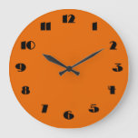 Modern Orange And Black Wall Clock at Zazzle