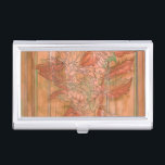 Modern Orange Floral Print on Stripped Background Business Card Holder<br><div class="desc">A Jennifer Goldberger original creation,  this modern orange floral print sits on a stripped background. The flowers almost blend in with the background. Let it blend in with the rest of your home by buying it today!</div>