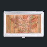 Modern Orange Floral Print on Stripped Background Business Card Holder<br><div class="desc">A Jennifer Goldberger original creation,  this modern orange floral print sits on a stripped background. The flowers almost blend in with the background. Let it blend in with the rest of your home by buying it today!</div>