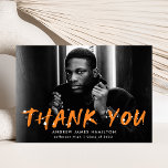 Modern Orange Paint Splatter Photo Graduation Thank You Card<br><div class="desc">Stylish, modern graduation thank you card featuring the graduate's horizontal photo with "Thank You" in orange lettering with white paint splatters. Personalize the front of the creative thank you card by adding the graduate's name, school name, and graduation year. The back of the graduation photo thank you card features space...</div>