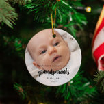 Modern Our First Christmas as grandparents Ceramic Ornament<br><div class="desc">A trendy typography and a modern design for this photo ornament gift. To customize with your favorite baby picture. You can also easily change the color of the font to your liking. Perfect to celebrate your First Christmas as new grandparents.</div>