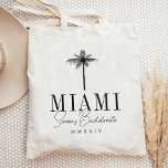 Modern Palm Tree Personalized Bachelorette Party Tote Bag<br><div class="desc">Welcome friends to your bachelorette weekend with these cute personalized tote bags. Perfect for beachy or tropical locales, this design features a black palm tree silhouette illustration with your destination beneath (shown with Miami) in classic serif lettering. Add your name(s) or occasion name beneath in handwritten cursive script, as well...</div>