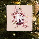 Modern Pastel Pink & Red Floral With Initial Ceramic Ornament<br><div class="desc">The Modern Pastel Pink & Red Floral With Initial design is a visually stunning and sophisticated combination of soft pastel pink hues and vibrant red tones. At the center of the design is a customizable initial, adding a personal touch to the overall aesthetic. The initial is bold and prominent, standing...</div>