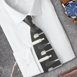 Modern Pastry Chef Bakery Baking Tool Design Neck Tie<br><div class="desc">This product design features illustrations of a whisk,  pin roller,  and spatula. The baking tool pattern in faux white gold on a dark gray background makes a modern and unique necktie for bakery and pastry chefs.</div>