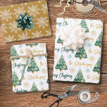 Modern Personalized Merry Christmas Tree Script Wrapping Paper Sheets<br><div class="desc">Create your own personalized coordinated set of novelty Christmas giftwrap with your choice of greeting (the sample shows MERRY CHRISTMAS) and your name or other custom text in a modern, trendy handwritten script font, a watercolor Christmas tree and snowflakes pattern in a green, gold and white color scheme. ASSISTANCE: For...</div>