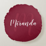 Modern Personalized Monogram and Name Burgundy Red Round Pillow<br><div class="desc">Personalized Monogram and Name Gift featuring personalized name in white modern script font style and monogram in light burgundy red modern script font style as background on burgundy red background. Perfect as holiday gift, family reunion favors, housewarming gift, wedding gift, thank you gift for bridesmaids and gift for any special...</div>