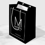 Modern Personalized Monogram and Name Groomsmen Medium Gift Bag<br><div class="desc">Add a personal touch to your wedding with personalized groomsmen gift bag.
This gift bag features personalized groomsman's monogram and name with title and wedding date in white modern sans serif font style on black background.

Also perfect for best man,  father of the bride and more.</div>