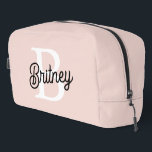 Modern Personalized Monogram and Name Pastel Pink Dopp Kit<br><div class="desc">Introducing our Modern Personalized Monogram and Name Pastel Pink Dopp Kit, a stylish and practical accessory for all your travel needs. This Dopp kit features a sleek design in soft pastel pink, personalized with your monogram and name for a unique and elegant touch. Perfect for organizing toiletries and grooming essentials,...</div>