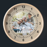 Modern Photo Grandpa Script Heart Clock<br><div class="desc">Modern Photo Grandpa Script Heart Wall Clock features your favorite photo with the text "We (heart) you Grandpa" in a modern white typography overlay. Personalize by editing the text in the text box provided. Designed by ©Evco Studio www.zazzle.com/store/evcostudio</div>